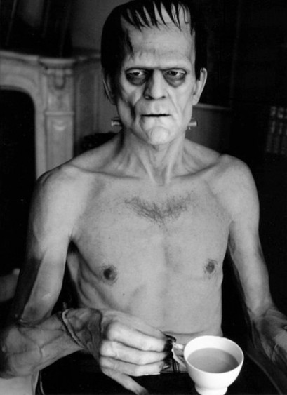 Boris Karloff takes tea during a break in the filming of Frankenstein (1931)