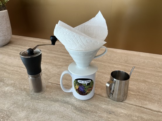 Pour over coffee setup with Hario V60 and a paper towel as the filter
