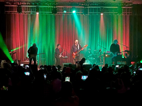 The Australian band The Church play their song “Reptile” with green and red lighting at The Heights Theater in Houston, TX.