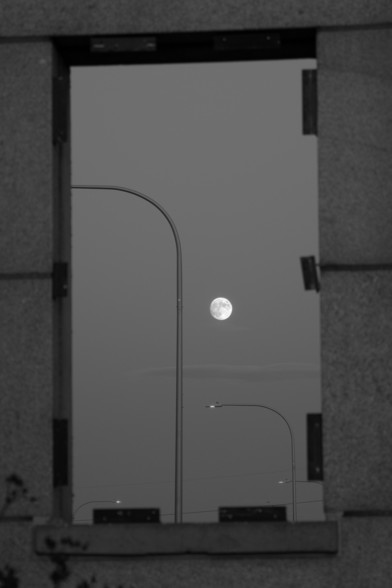 Moon through the 'window' on the linear park bridge in Providence on Oct 27th 2023