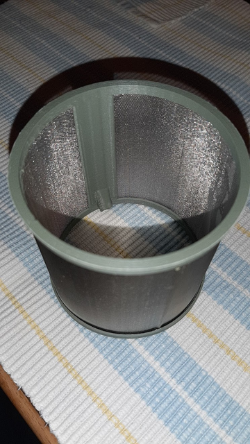 Dishwasher filter frame 3d printed in PLA, before testing it in the dishwasher.