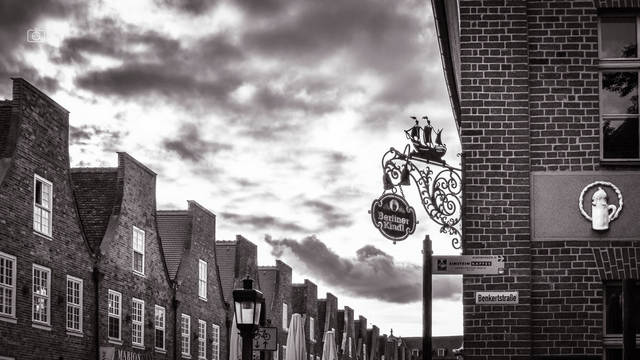 Flying Dutchman restaurant and rooflines of row houses in Dutch Quarter, 16 Oct 2023