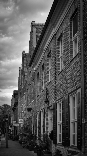 Row of brick townhouses and shops, Dutch Quarter, Potsdam, 16 Oct 2023