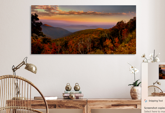 Virginia Mountains Blue Ridge Parkway sunset looking east toward Lynchburg overlook available here:

https://www.pictorem.com/879874/Virginia%20Blue%20Ridge%20Mountains%20Autumn%20Overlook%20.html