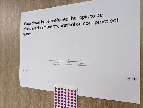 "Put one of these dots stickers on the scale" to provide session feedback on the wall outside the room 
