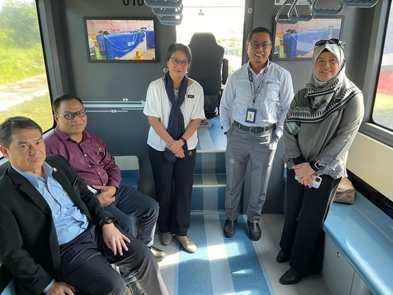 A group of people onboard the ART vehicle.