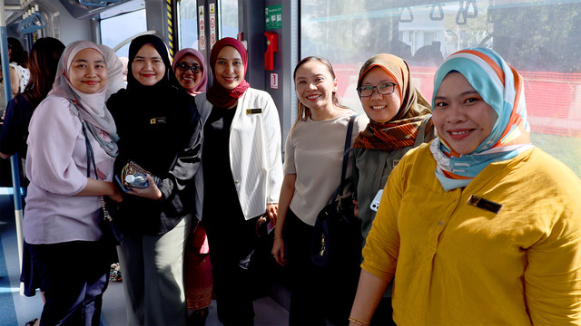 A group of people onboard the ART vehicle.
