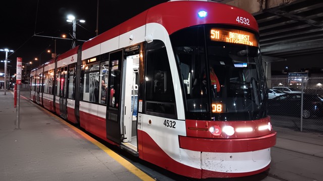 TTC 4532, a Bombardier Flexity streetcar. The front destination sign reads "511 BATHURST TO EXHIBITION", and the run number is 08.