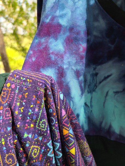 Close up showing the match between the skirt colors and the tie dye colors - it's not perfect but it's the same vibes!