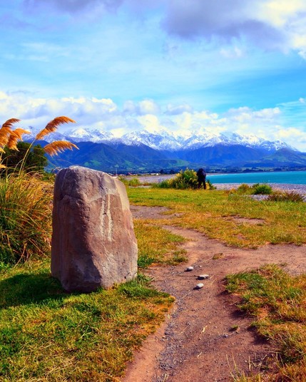 Lake Rotoiti, nestled in New Zealand's Nelson Lakes National Park, captivates with its crystal-clear waters, surrounded by pristine native forests and snow-capped peaks.