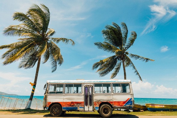 Photo by Rock Staar on Unsplash:

https://unsplash.com/photos/white-and-blue-bus-near-palm-tree-under-blue-sky-during-daytime-wGyHvtLcW_U