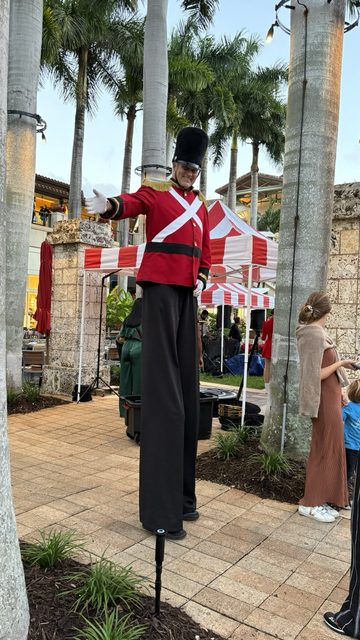 A man in a Christmas costume of the nutcracker.