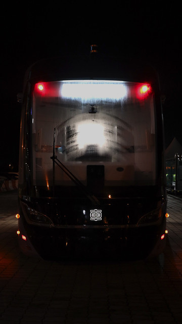 ART vehicle with traces from its wiper clearing rain droplets off the screen.
