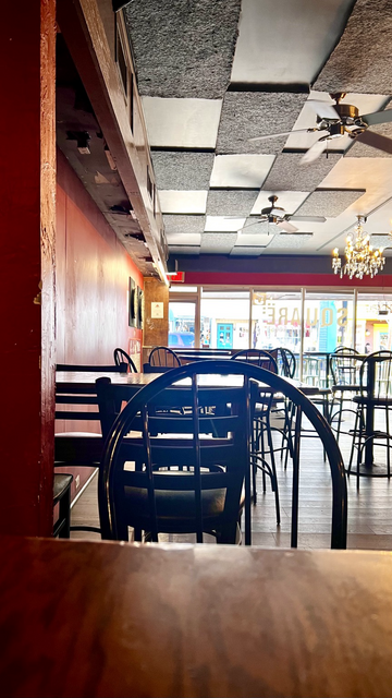 Photograph of an empty bar. Daylight illuminating the space. Square 5 Public House. Blacksburg, VA.  