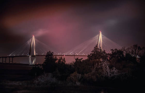 Charlesyon Arthur Ravenel Jr. Bridge at night available here:

https://pixels.com/featured/charleston-new-years-at-the-arthur-ravenel-bridge-norma-brandsberg.html?newartwork=true