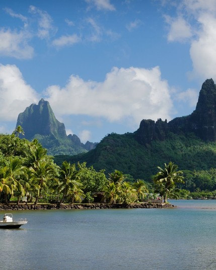 Cook's Bay with Moua Puta mountain in the background on the tropical island of Moorea, near Tahiti in the Pacific archipelago French Polynesia.