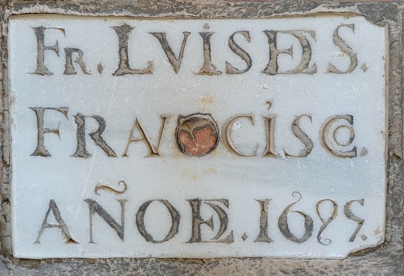 Grave marker for a Brother Luis de San Francisco showing examples of DE, AN, and CO ligatures 