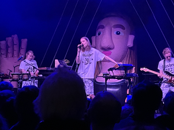 Daði Freyr performing on stage with his backing musicians 