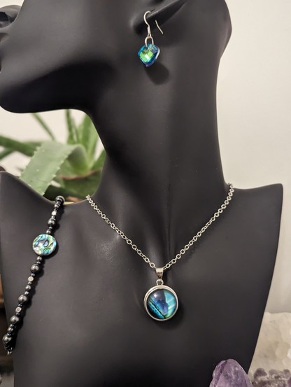 Handmade set with green glass triangle earrings and Aurora northern lights round pendant on a silver chain