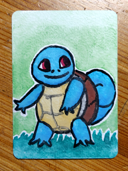 Une carte représentant Carapuce, le pokémon starter d'eau de Pokémon Rouge/Bleu/Vert, sur fond vert.