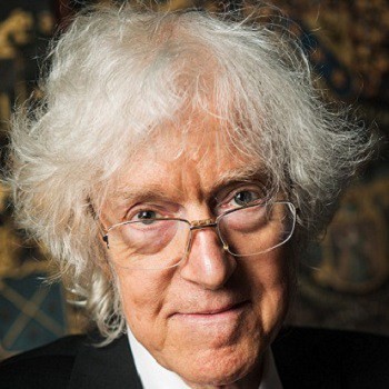 Colour photograph of Derek Parfit (headshot). Derek has white hair and is wearing glasses. 