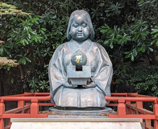 Statue of Okame, the wife of the head carpenter who built Daihoon-ji's main hall. When he miscalculated the length of pillars needed to support the building's roof, Okame came up with a solution that saved him from a sticky situation. She then killed herself to protect her husband's reputation (hoping her death would prevent anyone knowing about her husband's mistake...the story got out anyway!).