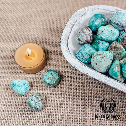 A photo of the "Chrysocolla Tumbled Gemstone" product from Inked Goddess Creations.
