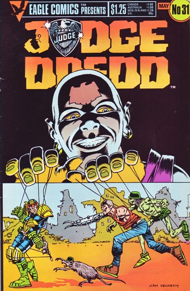 The front cover of Judge Dredd, Vol 1, No 31 from May 1986, featuring cover art by Cam Kennedy showing The Judge Child as the puppetmaster pulling the strings of Dredd, Fink Angel and Mean Machine.