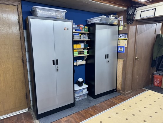 Two metal cabinets and shelves