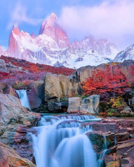 Mount Fitz Roy and the cascading waterfall at dawn in the Andes of Patagonia, Argentina, South America