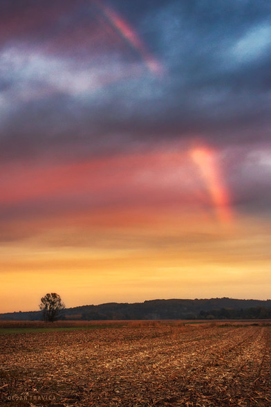I photographed this unusually beautiful scene one October evening. The sun has just set when a rainbow appeared in the sky out of nowhere. There was no rain or sun after the rain, but she was there. It looked like a small aurora borealis, but in the heart of the Balkan Peninsula. She was there for a while and then disappeared as quickly as she appeared. Sumadija, Central Serbia. From the Autumn Fields Collection.
