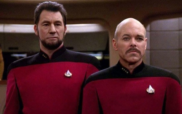 Commander Riker & Captain Picard with their faces switched.  One looks a bit like a young Abe Lincoln, the other looks like Gomez Addams.