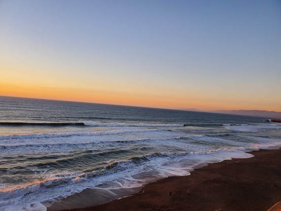 The waves were not particularly crashy tonight; just their usual soothing rumble.  No unruly splashing over the seawall; one might actually imagine the ocean to be contained.  One would be wrong, of course.