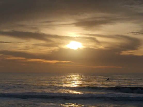 Old Sol bring surrounded by cloud dragons, but not giving in.  Hiding the light, it seems, is always temporary.