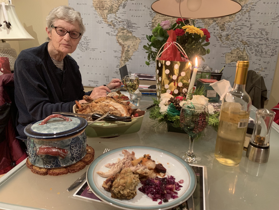 Woman enjoying a holiday feast.