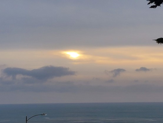 Old Sol giving it a good try, but the cloud dragons are mighty this evening.  Getting to the horizon without being completey hidden is going to be a real challenge.