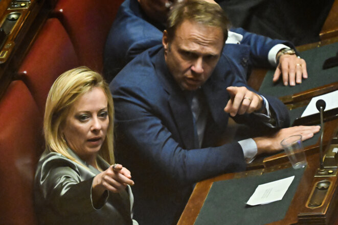 Giorgia Meloni et son beau-frère Francesco Lollobrigida, ministre de l'agriculture italien, le 14 octobre 2022. © Alberto PIZZOLI / AFP