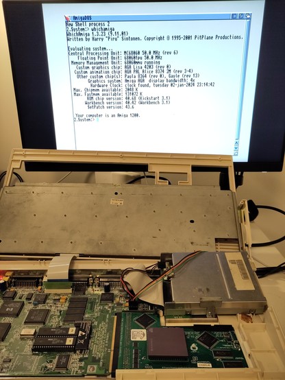The chip-in-test is in test. WhichAmiga reports it's a "full" 68060 with FPU and MMU included, and it's a Rev. 6.