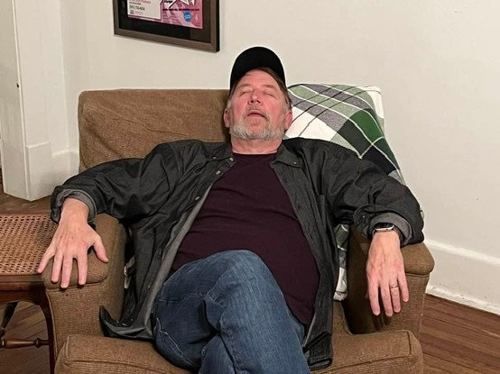 Me, completely zonked out in a chair after finishing a difficult night of rehearsal. 