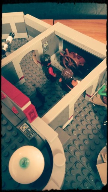 Captain Kirk's Lounge from Star Trek V (complete with antique ship's wheel)

A LEGO MOC 