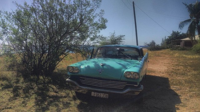 A vintage Chrysler car from the 50's retrofitted with a Fiat engine