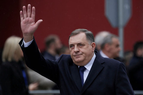 Bosnia's Serb Republic President Milorad Dodik waves as he attends his region's national holiday, banned by the constitutional court, in East Sarajevo, Bosnia, January 9, 2023