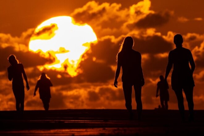 Sur la plage de « Isle of Palms » lors de la vague de chaleur dans le sud des États-Unis en juillet 2023. © Photo Richard Ellis / Zuma Press Wire / REA