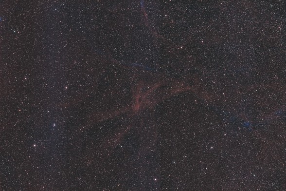sh2-96:
Background is black with very many stars throughout. There are some whispy streams of faint red nebulosity in the center of image. A couple brighter ones intersect in a V shape.

There is also a very faint and thin line of blue just above center.