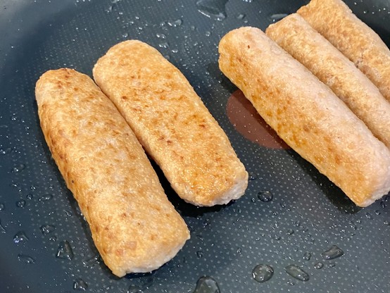 Perfect Sosmix sausages browning in a pan