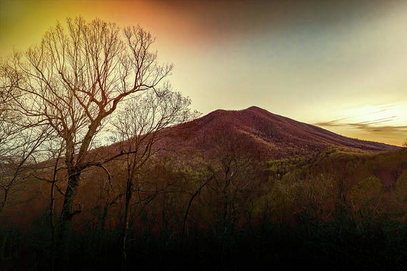 Peaks of Otter off the Blue Ridge Parkway in early spring silhouettes prints here:

https://pixels.com/featured/peaks-of-otter-silhouettes-norma-brandsberg.html