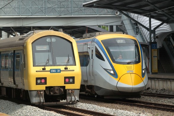 KTM Komuter train and KTM ETS train side by side on the railway track. / Photo from linked article.
