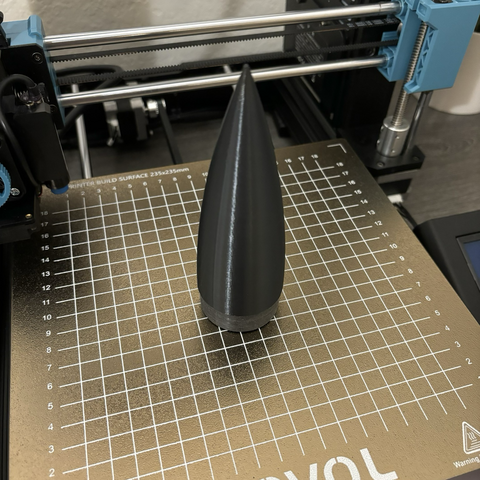 An ogive nosecone in black filament