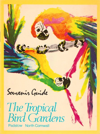 The front cover of The Tropical Bird Gardens, Padstow, North Cornwall: Souvenir Guide by Jack Brown. White with a yellow border and a large and very colourful illustration of two macaws or parrots.