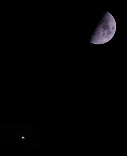 Waxing gibbous moon in the top right of the picture, Jupiter and a few of its moons in the bottom left. Shot with a Canon EOS 700D camera attached to my Skywatcher Evostar 72ED telescope on a static tripod. iso 400, Moon exposure 1/1000 of a second, Jupiter exposure 1/3 of a second.